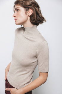 Maglione dolcevita a maniche tre quarti in maglia rasata