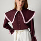 Camicia bordeaux con maxi colletto a contrasto e volant