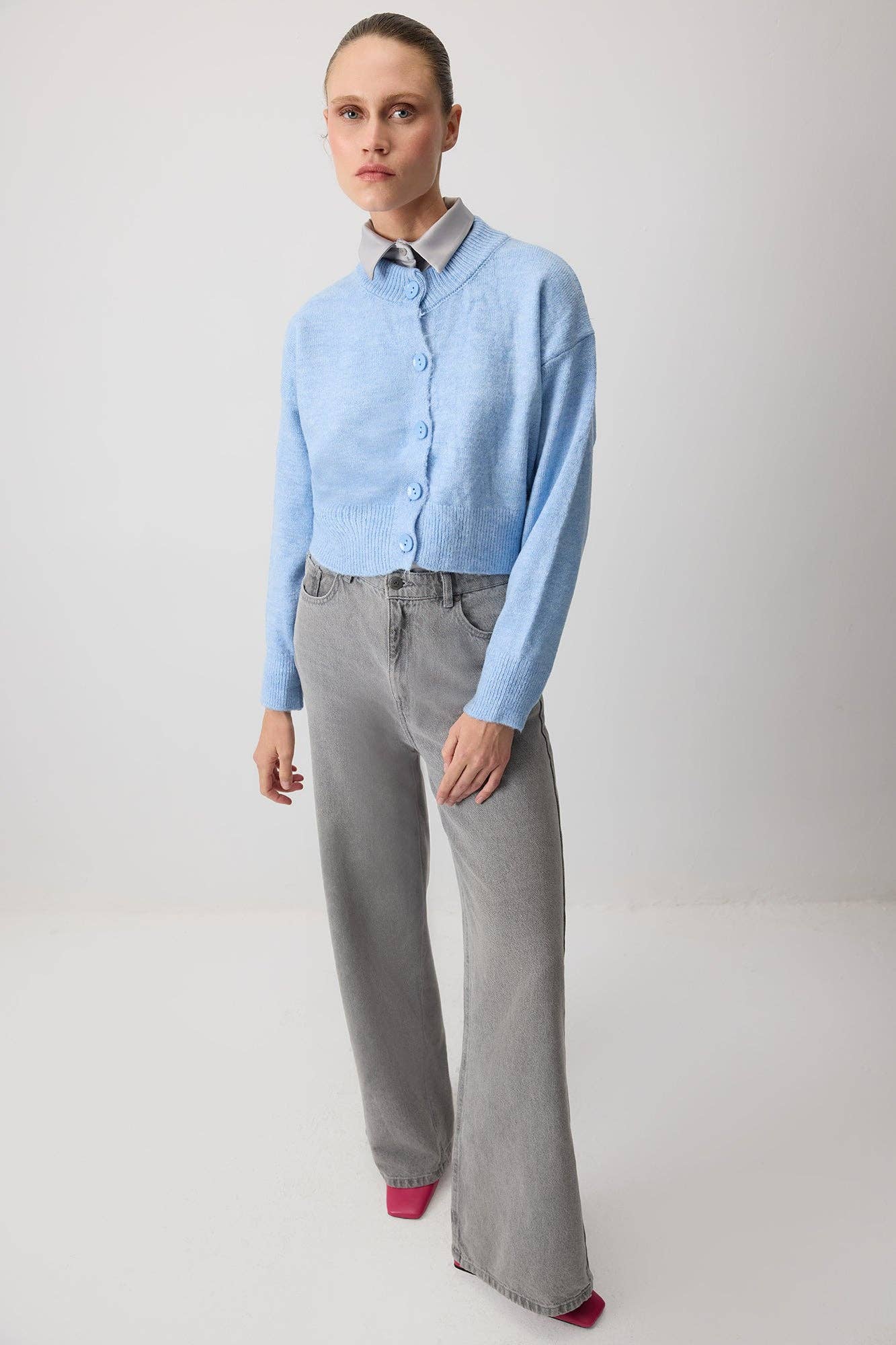 Cardigan corto in maglia con bottoni