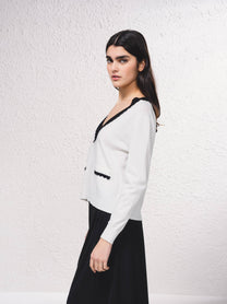 Maglione a maglia fine con scollo a V e tasche