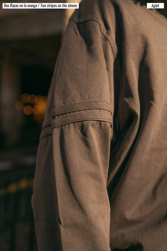 Polo uomo a manica lunga in cotone biologico con stampa grafica