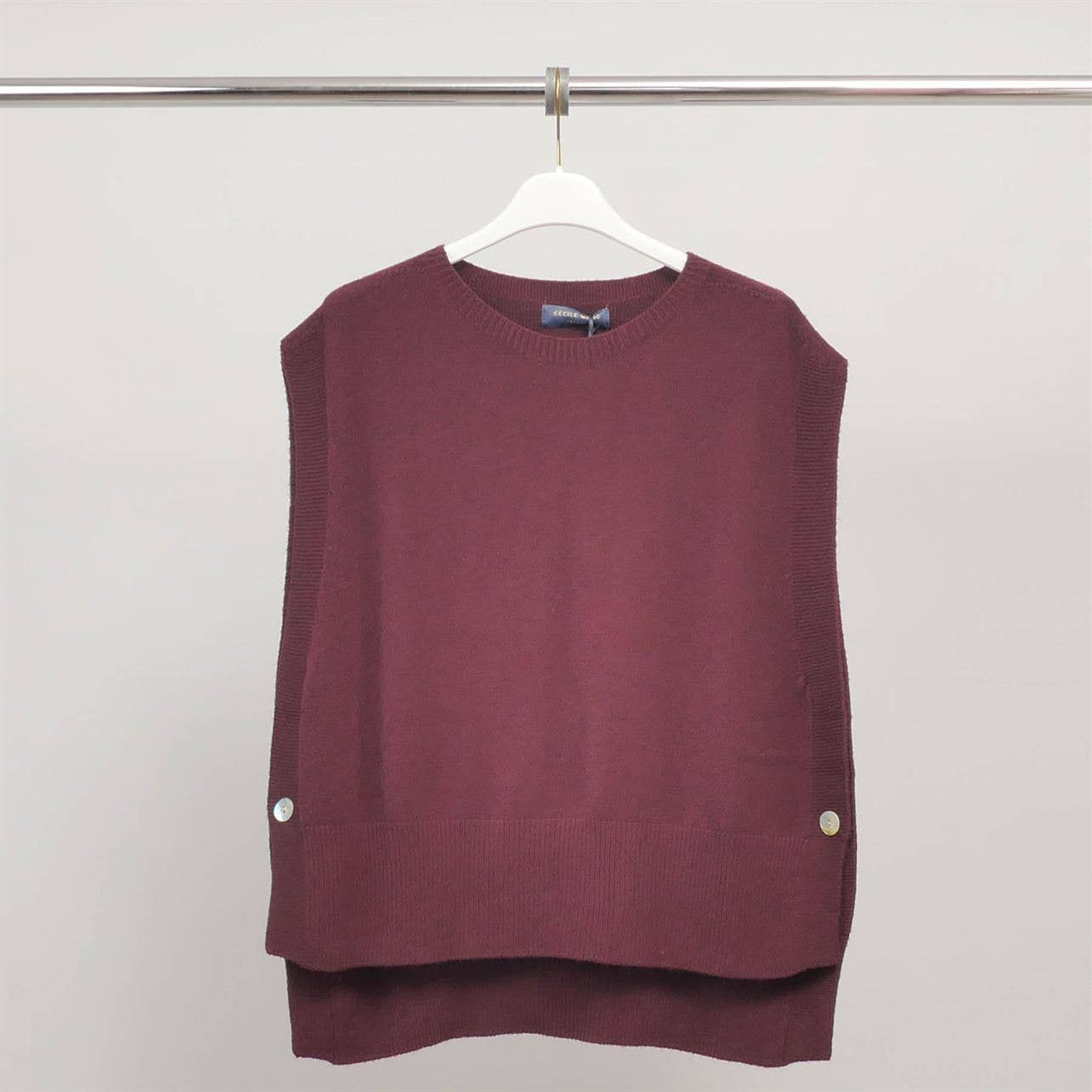 Poncho senza maniche in maglia strutturata con girocollo