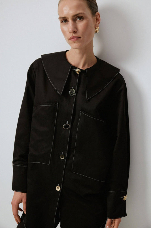 Camicia oversize con cuciture a contrasto e maxi tasche