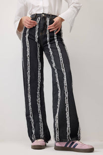 Pantaloni in denim con frange