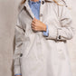 Impermeabile donna con bottoni effetto tartaruga