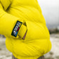 Piumino giallo in poliestere riciclato con cappuccio