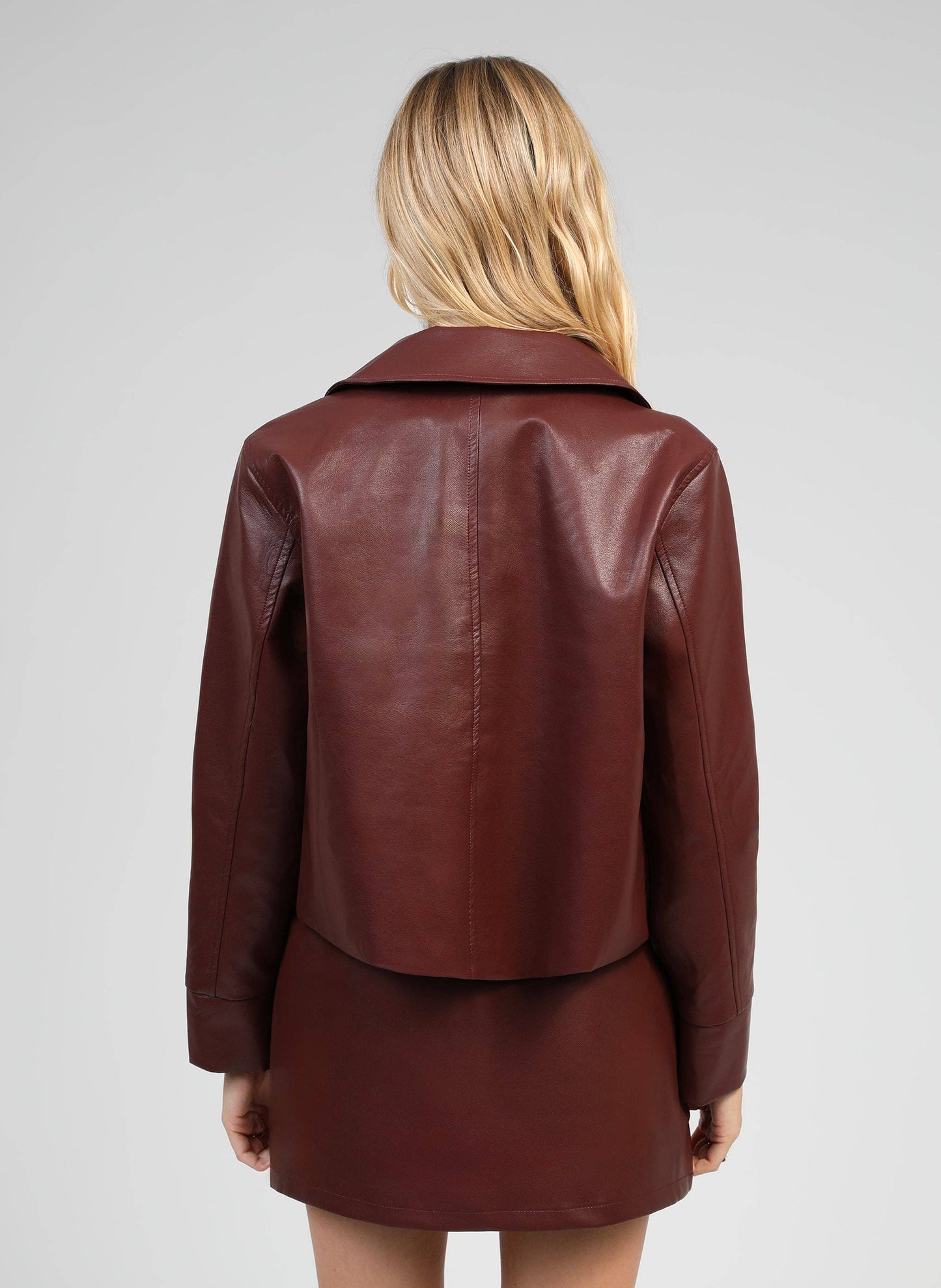 Giacca Claudiane in similpelle color vino