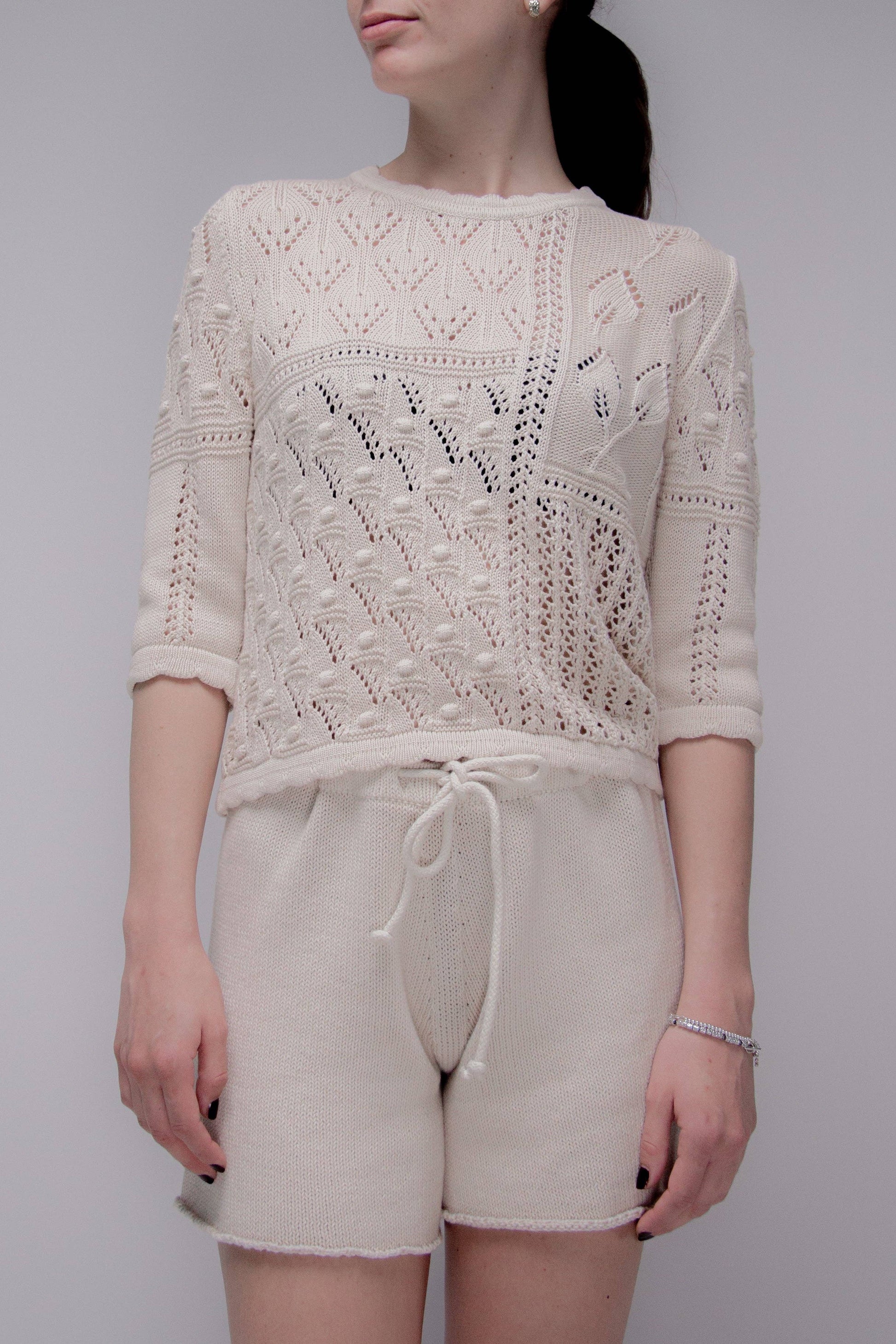 Maglia traforata in cotone con motivo floreale