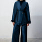 Completo donna blu navy con giacca asimmetrica e pantaloni palazzo