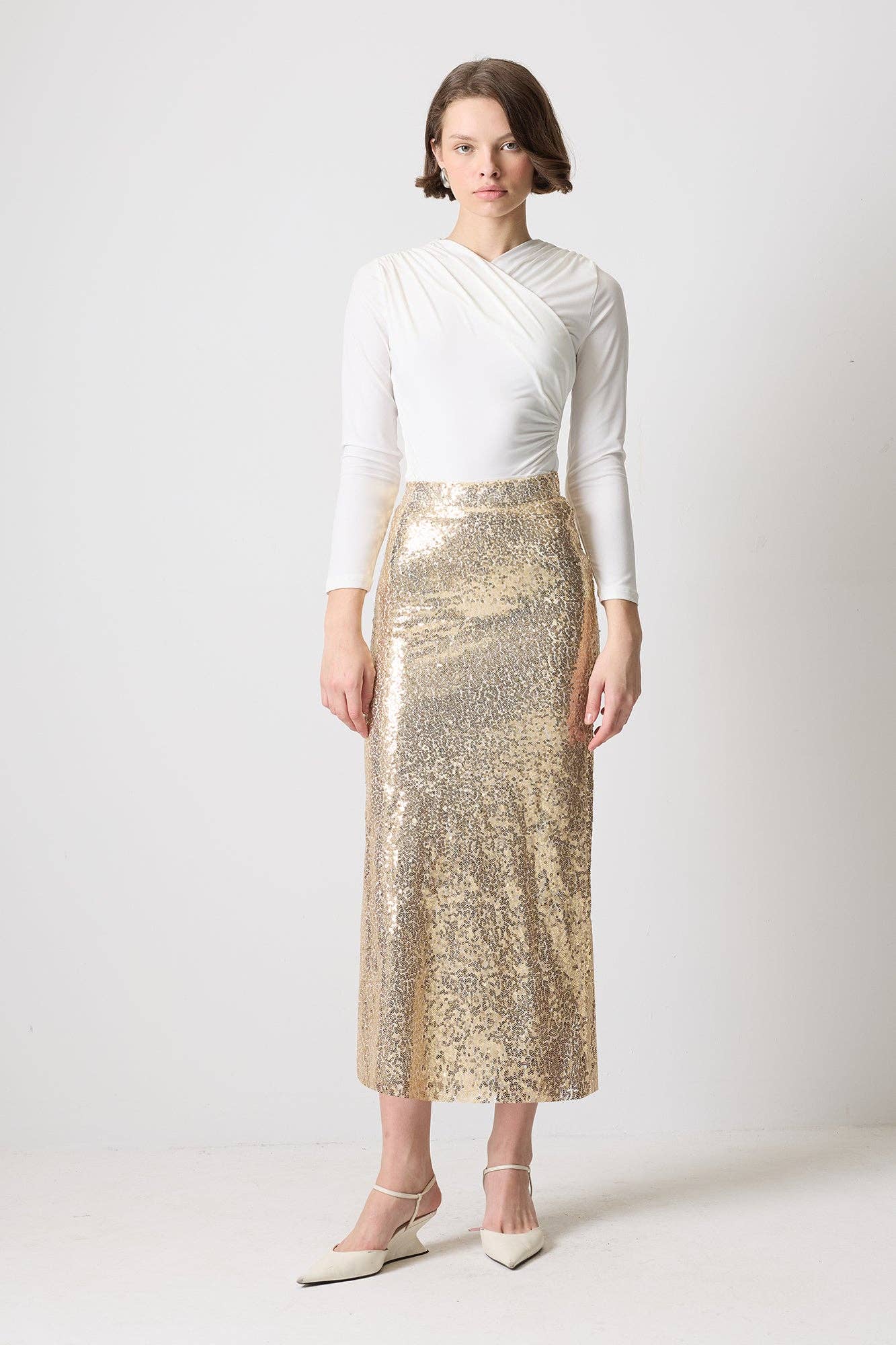 Gonna midi a vita alta in paillettes oro