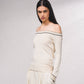 Maglione off-shoulder in lurex con profili a contrasto