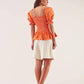 Blusa elasticizzata arancione a maniche a sbuffo