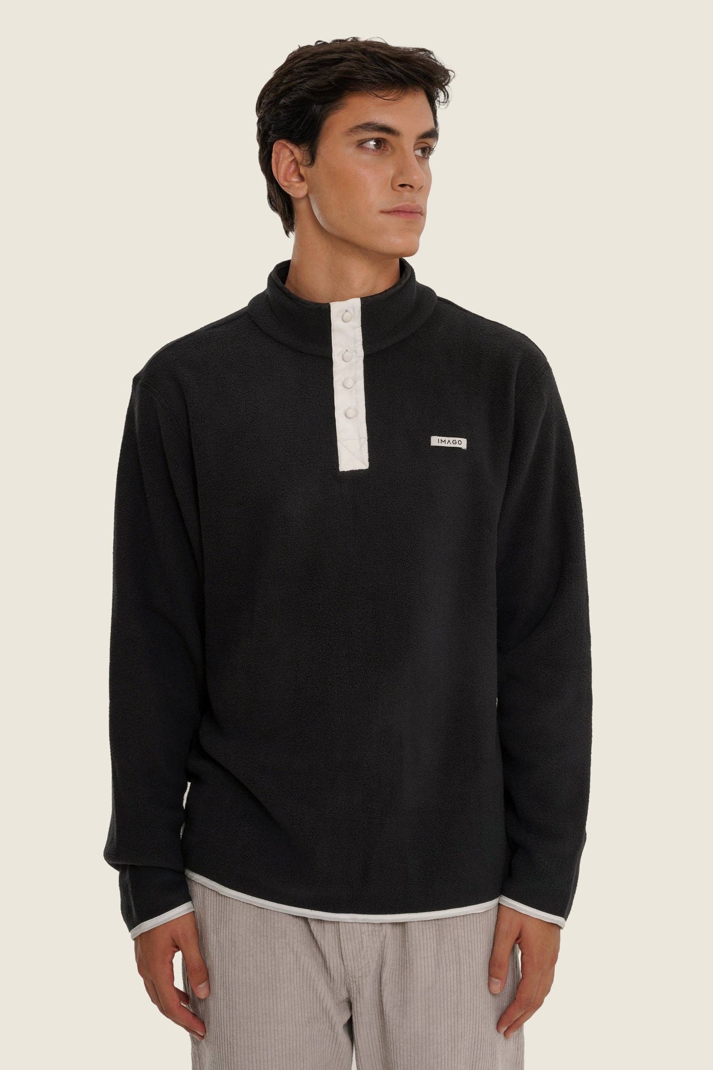 Maglione in pile nero unisex in cotone organico