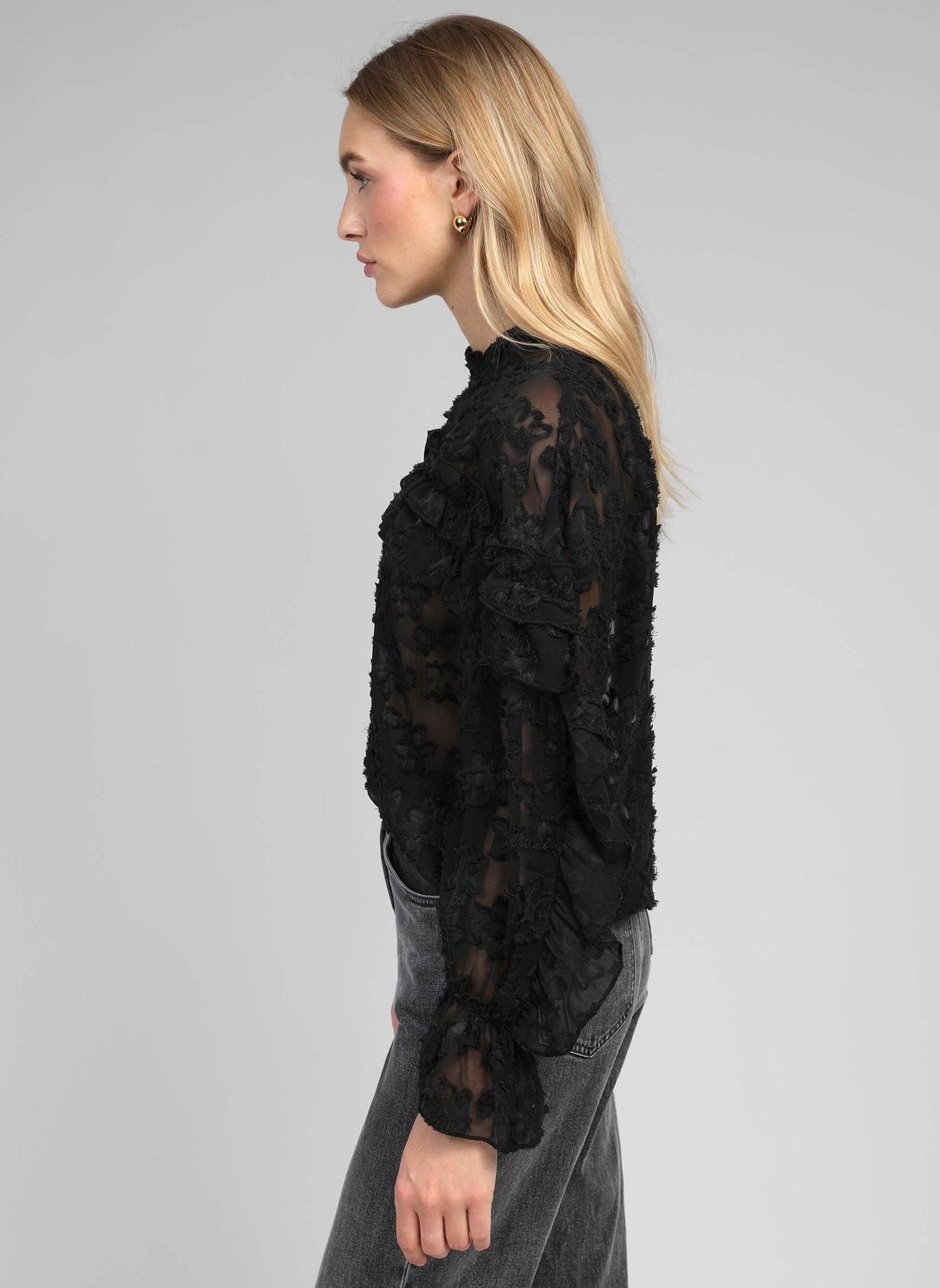 Blusa trasparente jacquard con volant