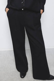 Pantaloni palazzo neri con piega frontale