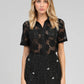 Camicia in pizzo nero con colletto e maniche corte