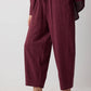 Completo con camicia a quadri e pantaloni bordeaux