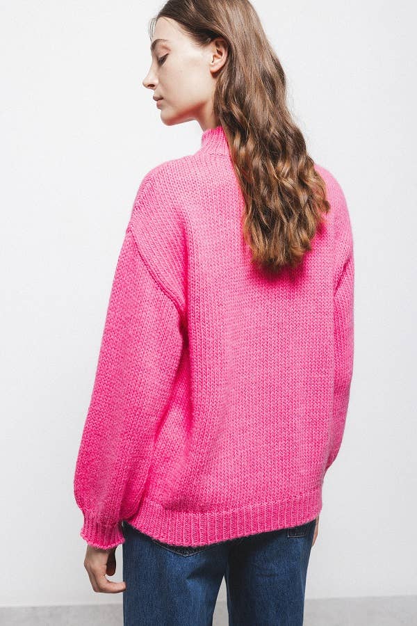 Maglione in maglia a trecce fucsia