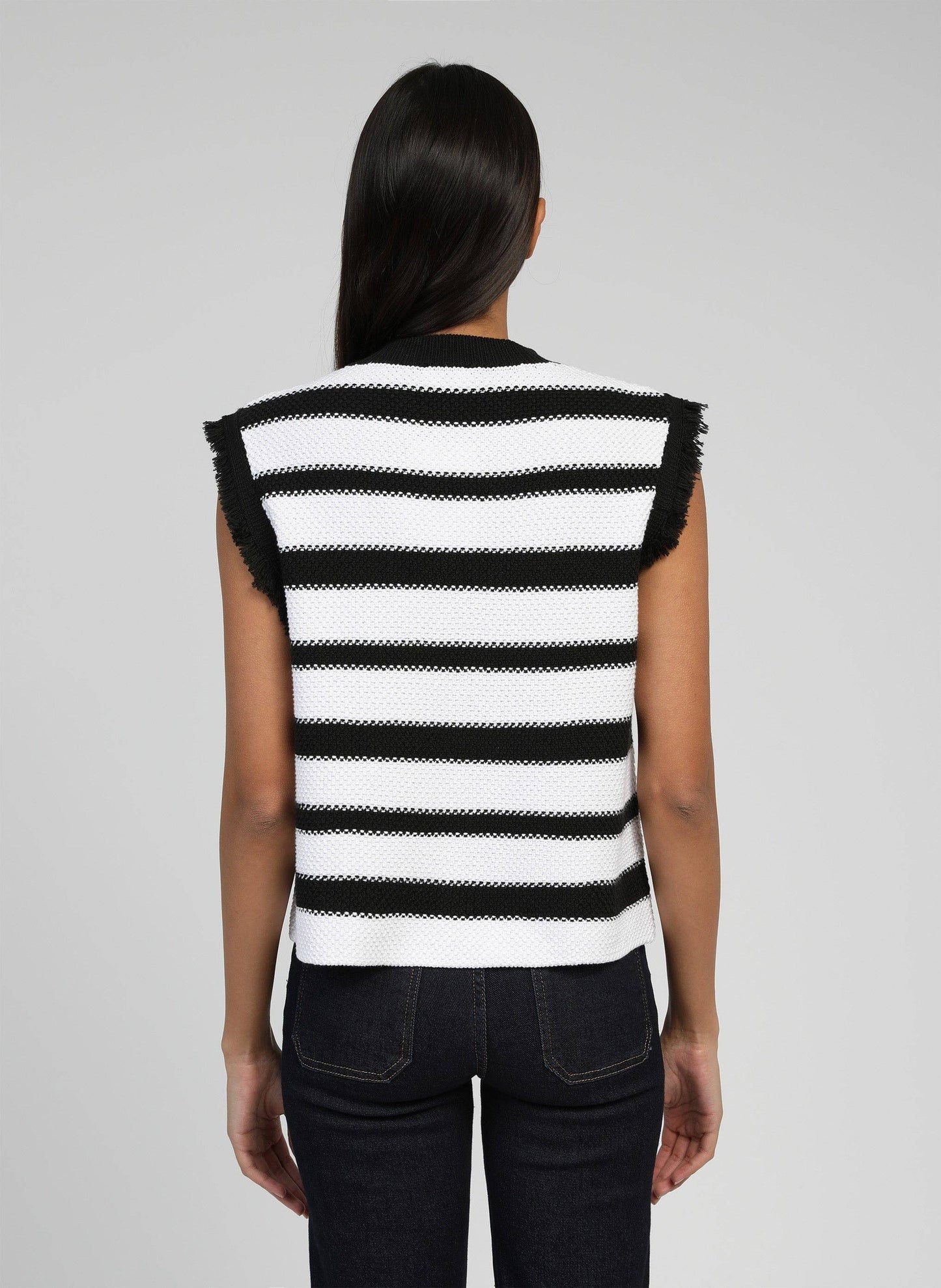 Cardigan smanicato a righe con bottoni gioiello