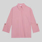 Camicia a righe rosa con polsini ampi