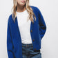 Cardigan in maglia blu con scollo a V