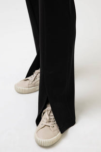 Pantaloni a vita alta in jersey con spacchi frontali