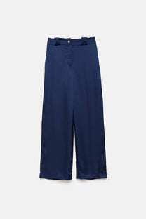 Pantaloni palazzo a gamba larga con tasche