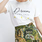 T-shirt Dreams con scritta e fiori applicati