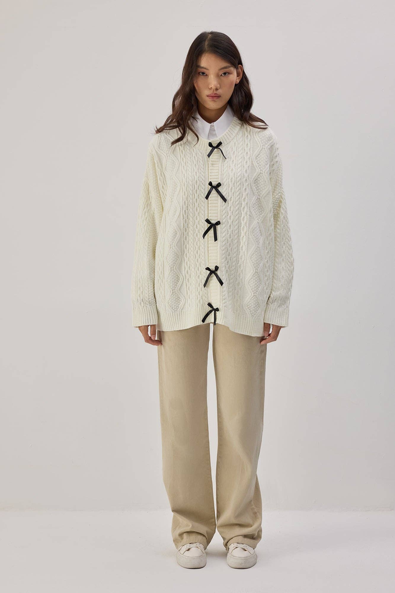 Cardigan in maglia con dettagli a fiocco