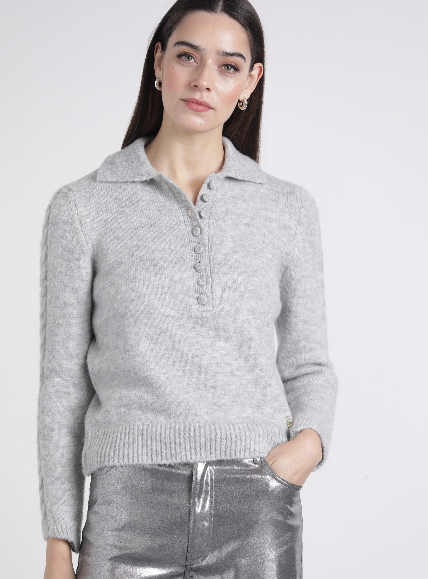 Polo in maglia con maniche a treccia