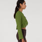Blusa corta verde con fiocchi e volant