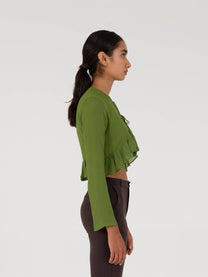 Blusa corta verde con fiocchi e volant