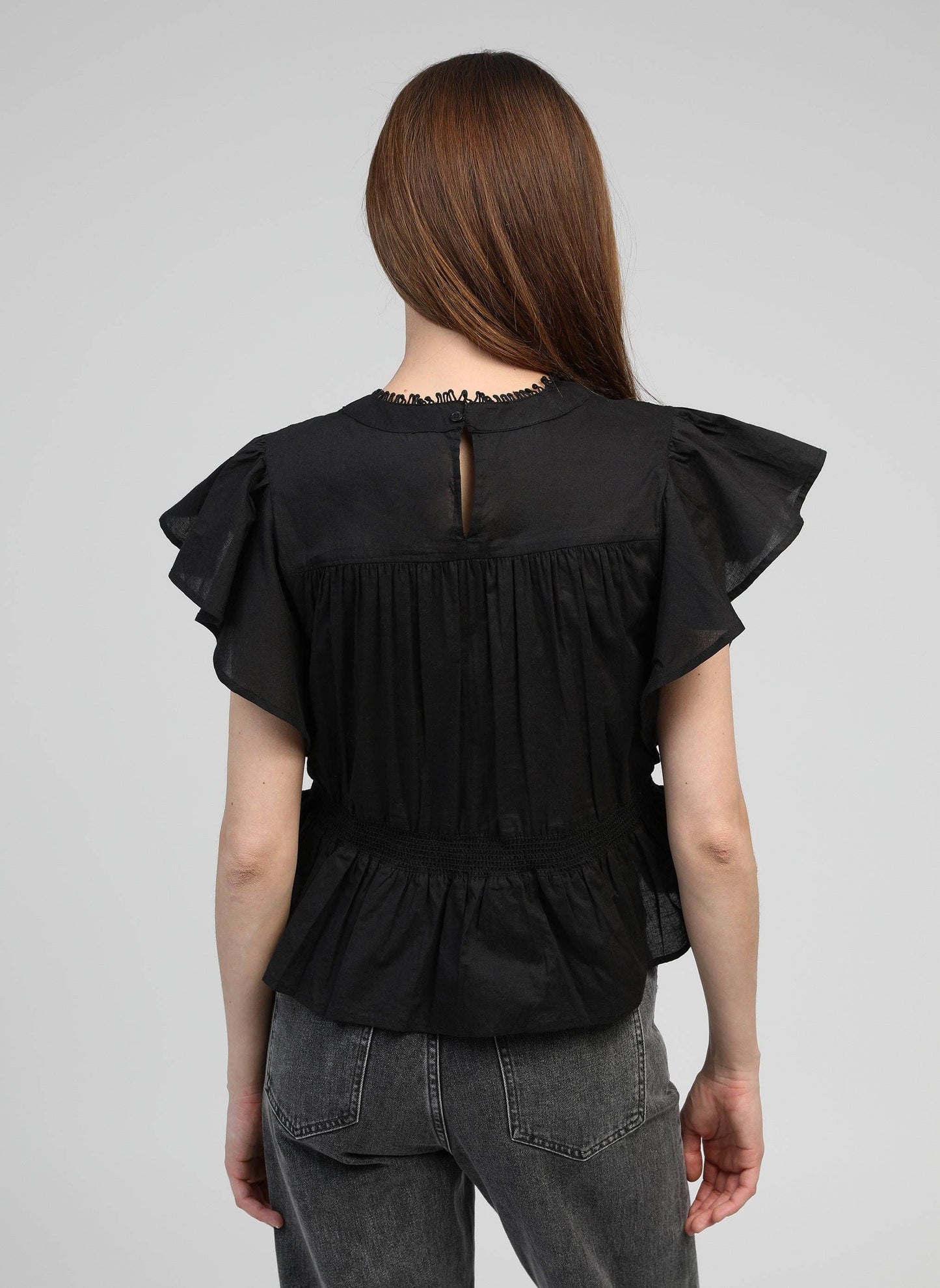 Blusa nera Salek con volant