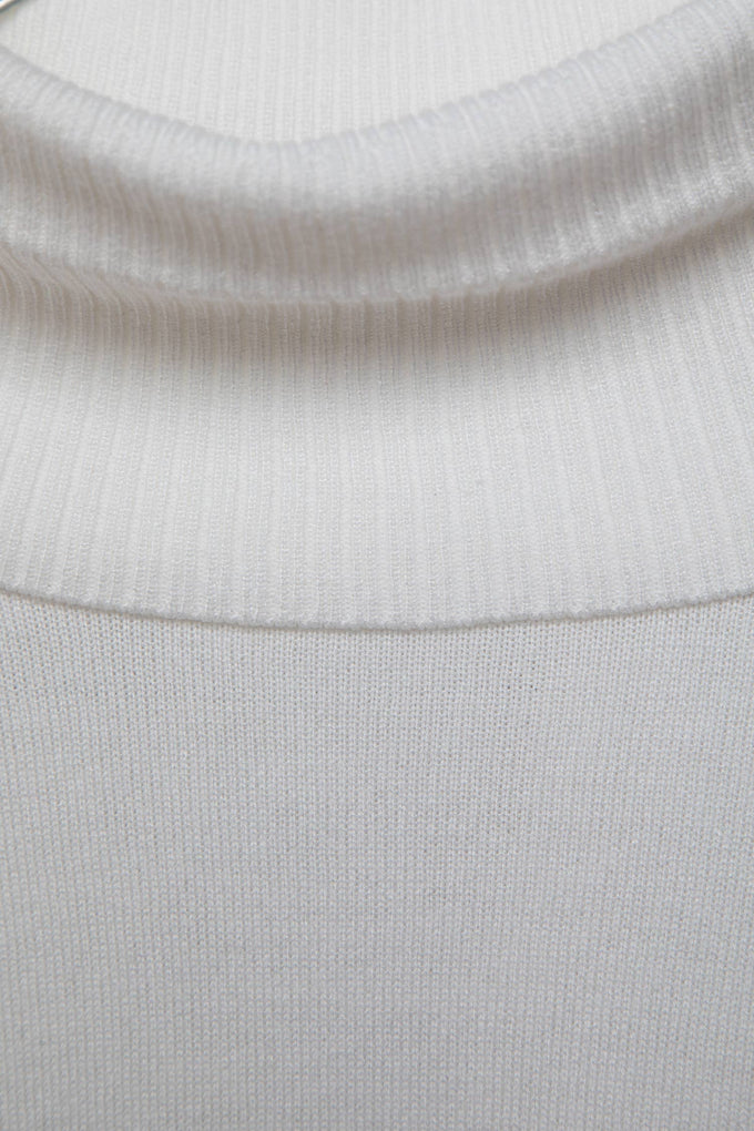 Maglione a maglia rasata con collo alto