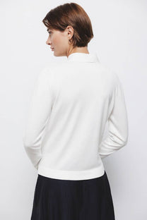 Maglione in maglia rasata con scollo a V e fiocco