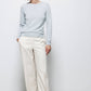 Pantaloni dritti minimal con tasche oblique