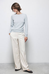Pantaloni dritti minimal con tasche oblique
