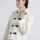 Cappotto corto teddy con chiusure a gancio