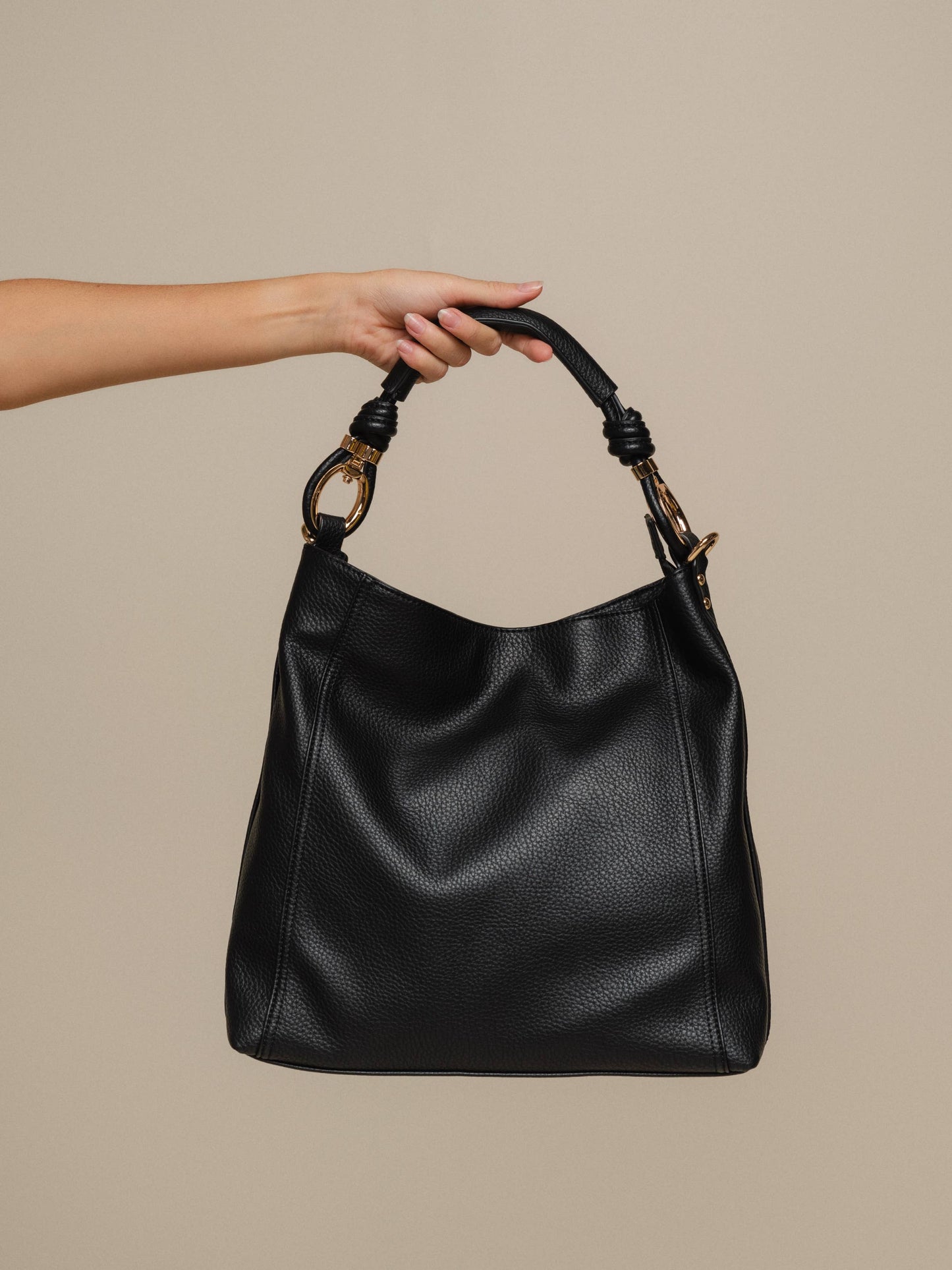 Borsa hobo in ecopelle con manico intrecciato