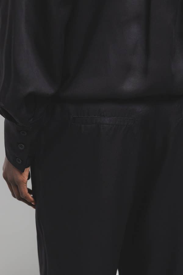 Pantaloni a pieghe dritti in lyocell