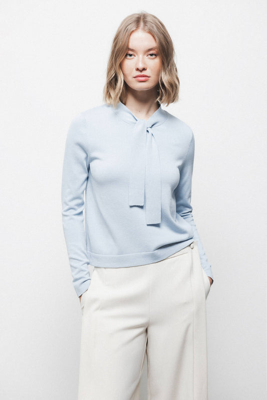 Maglione in maglia rasata con fiocco e scollo a V