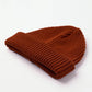 Berretto in lana merino a coste color ruggine