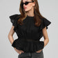 Blusa nera Salek con volant