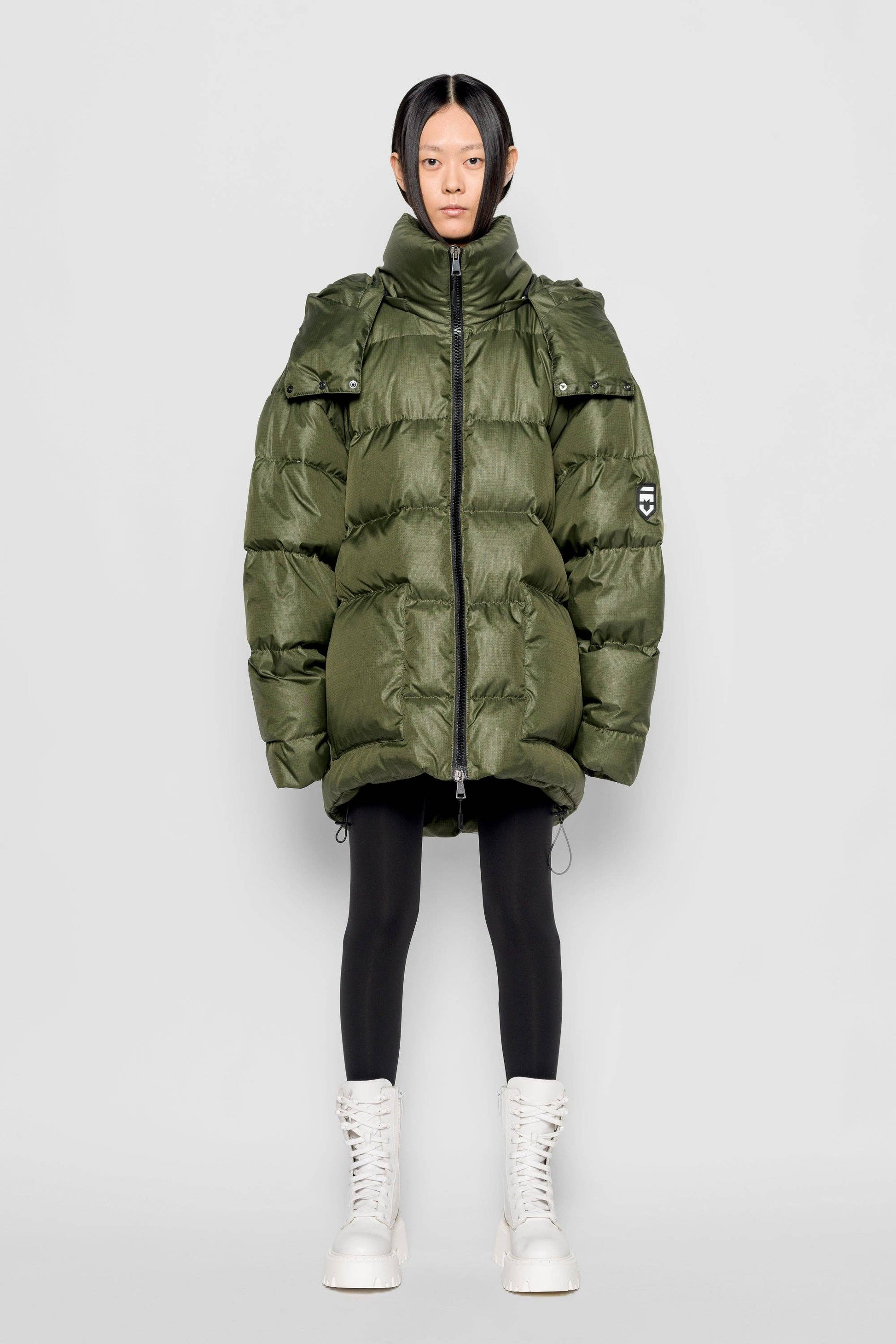 Piumino Iconica verde militare con cappuccio removibile