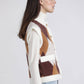 Gilet in maglia jacquard a rombi con bottoni