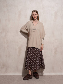Cappa in maglia con fibbia decorativa