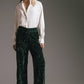 Pantaloni con paillettes verdi