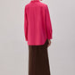 Camicia in popeline fucsia con accessori in metallo