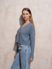 Cardigan corto in maglia con scollo a V e tasche