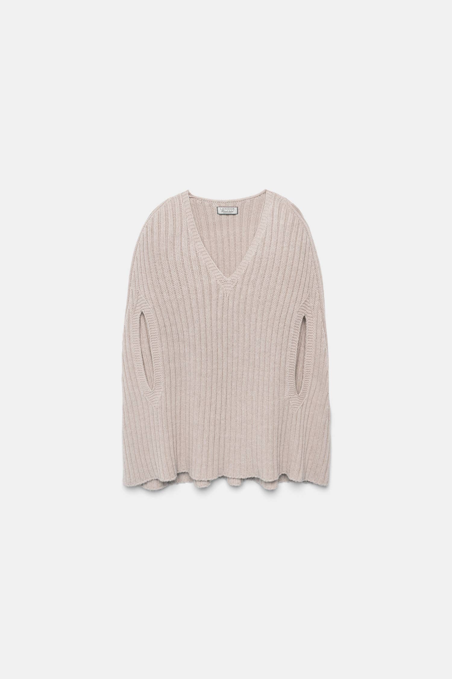 Poncho a coste con scollo a V